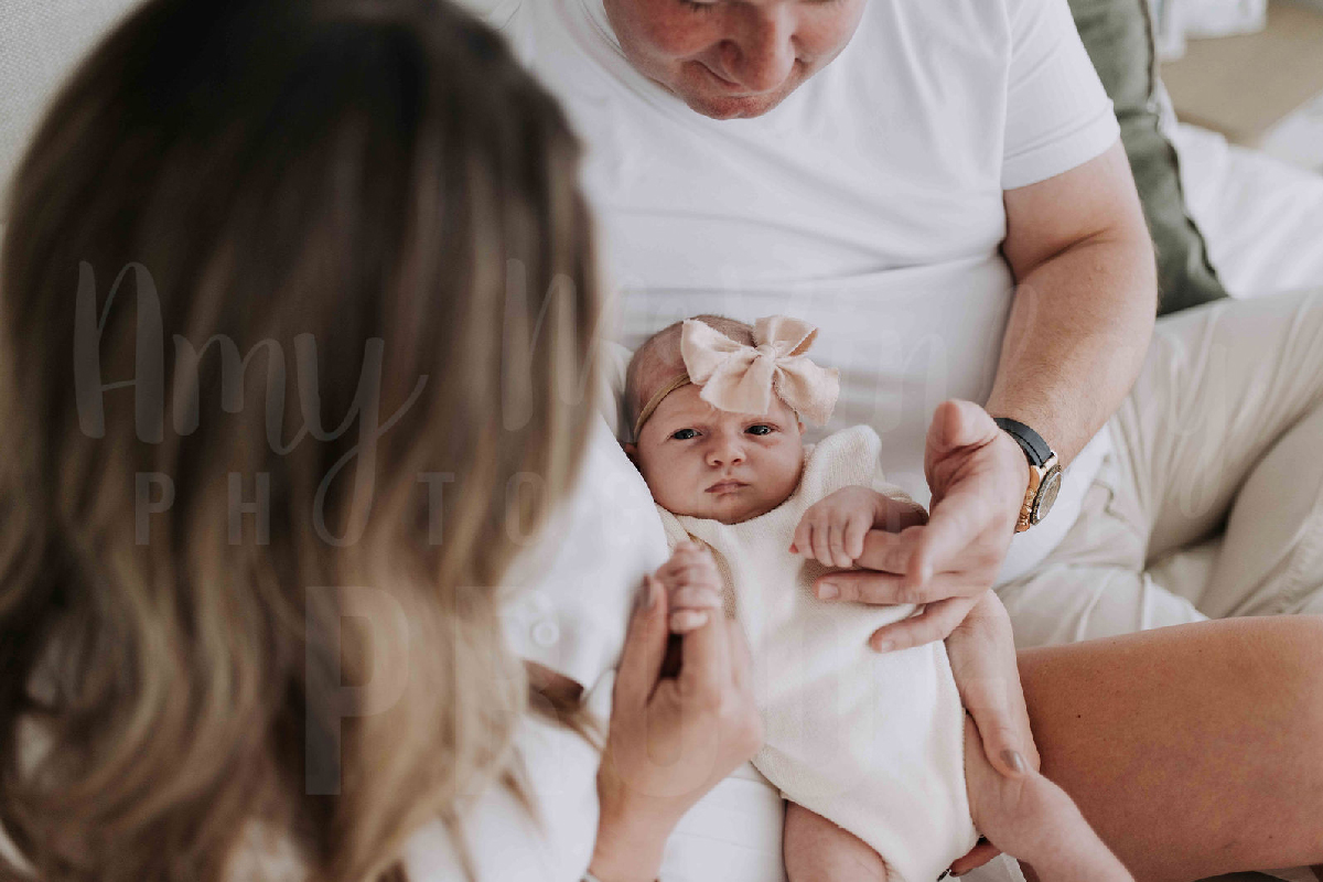 Newborn baby Layla Rose Johnson smilin